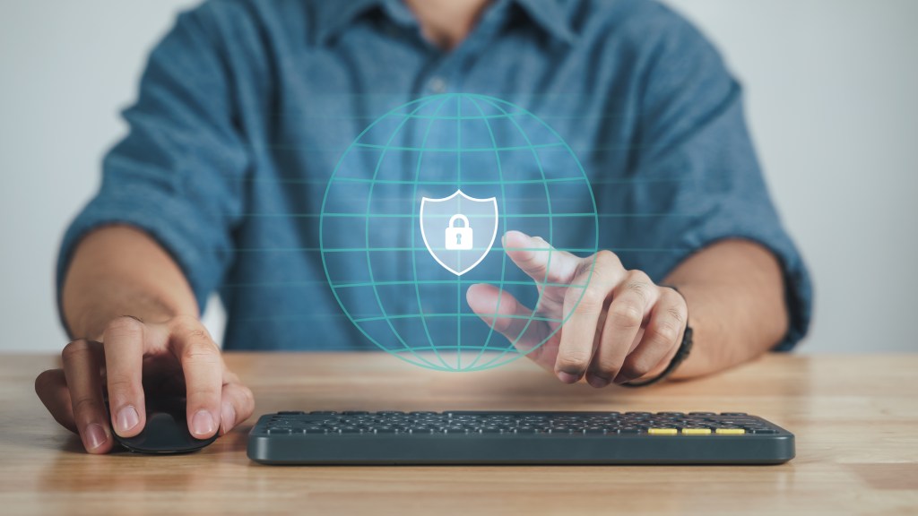 Young mans hand touching on virtual Screen Padlock Icon. data protection, information privacy, Cybersecurity, Unlock, internet networking technology concept.